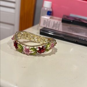 Elegant Gold and Green Bracelet with Botanical Charm